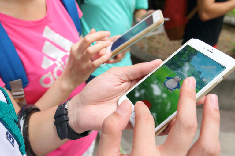 Close-up shot of Players caught the Pokemon in Hong Kong